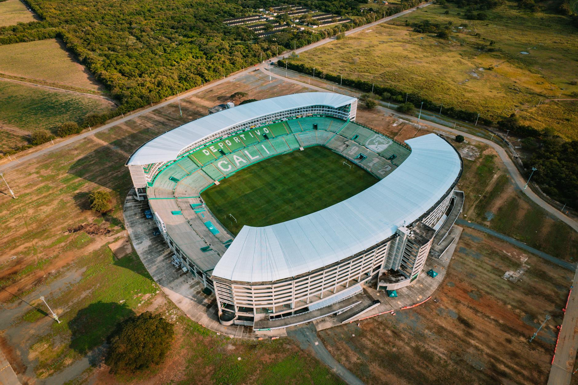 Aerial shot of the Deportivo Cali Stadium, showcasing its architecture and surrounding landscape.