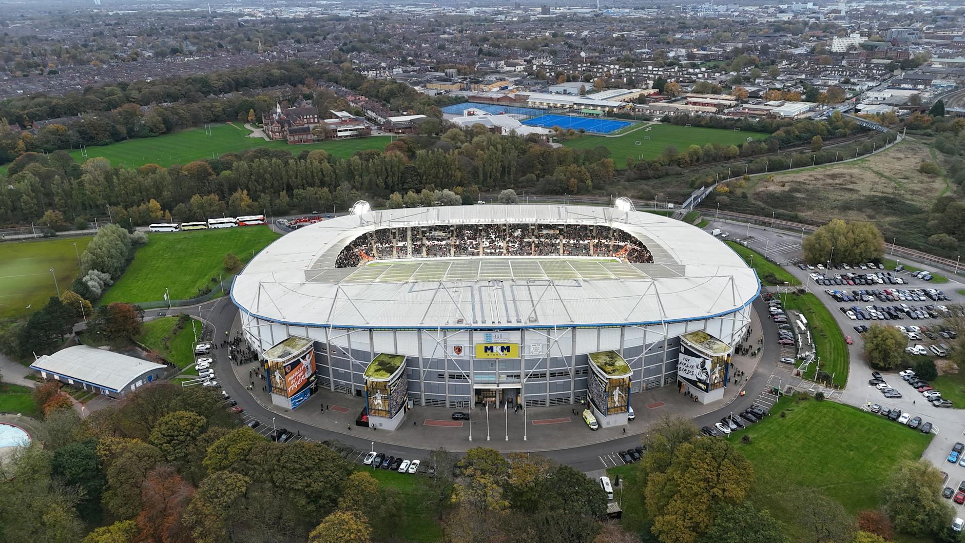 Stunning aerial image of MKM Stadium in Hull showcasing its unique architecture amidst a cityscape setting.